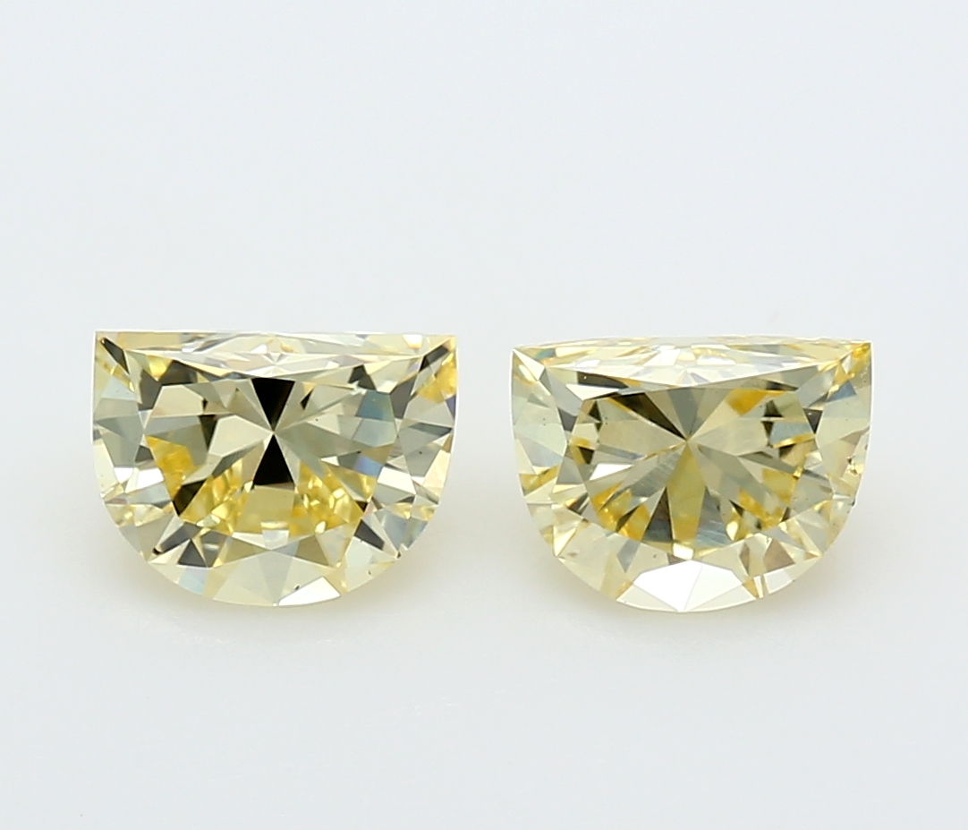 Matched pair of Half Moon lab grown diamonds, 8.00 × 5.10 mm, Fancy Vivid Yellow VS1, 2.12ct total